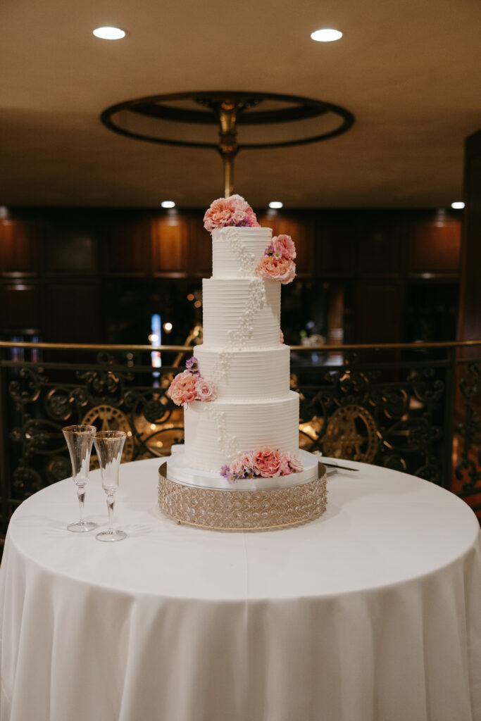 Wedding cake with pink flowers